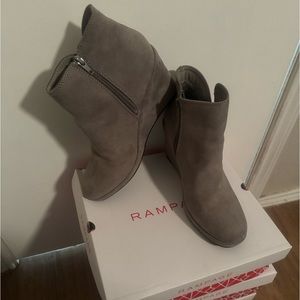 3.25’ wedge booties. Worn once. Had foot surgery and can’t wear this height now.